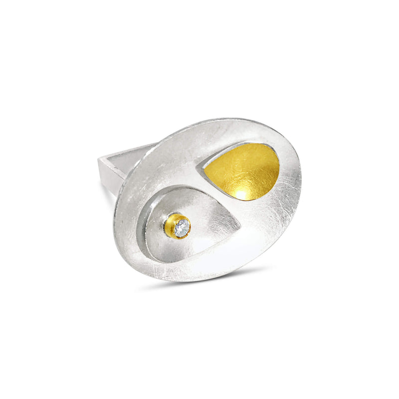 square sculptural ring with gold and silver tear drops